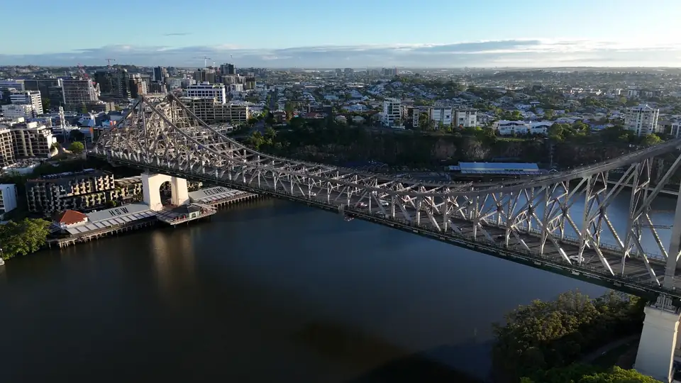 Aerial view of the Story Bridge over the Brisbane River at dawn
