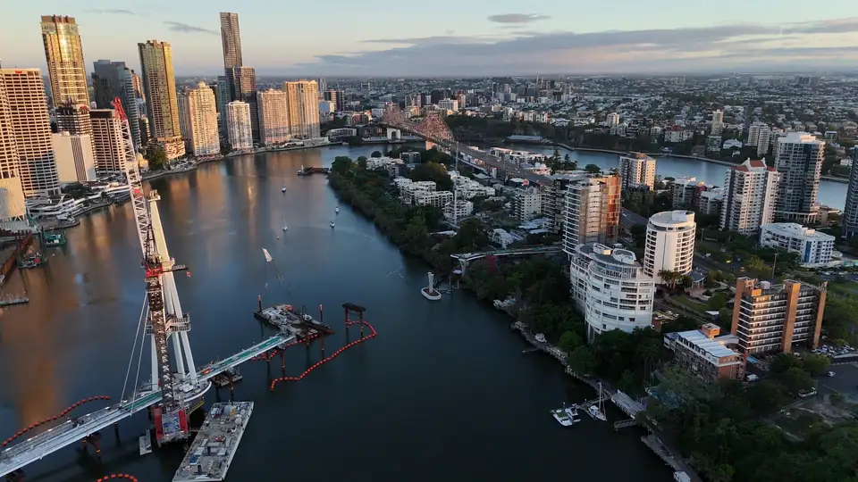 Aerial view of Kangaroo Point and the Brisbane River in front of the city towers