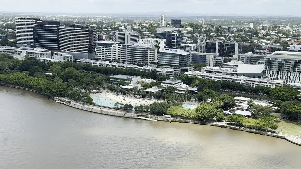 Aerial view over South Bank and the Brisbane River on a clear day